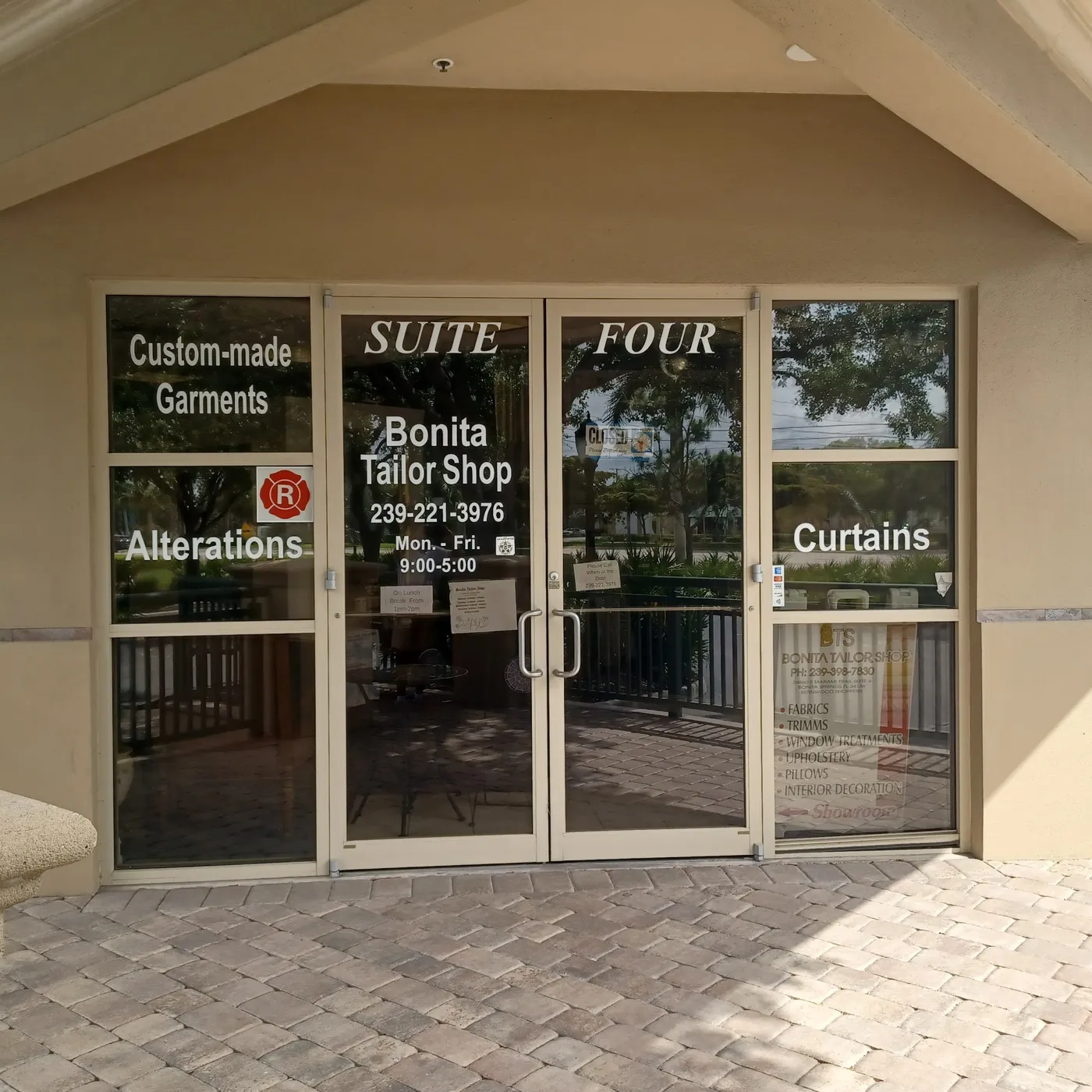 The Bonita Tailor Shop entrance, Suite Four, with Alterations and Curtains on the windows